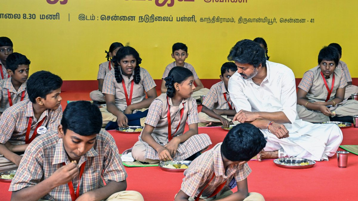 Tamil Nadu CM Vijay eats with children at breakfast scheme launch