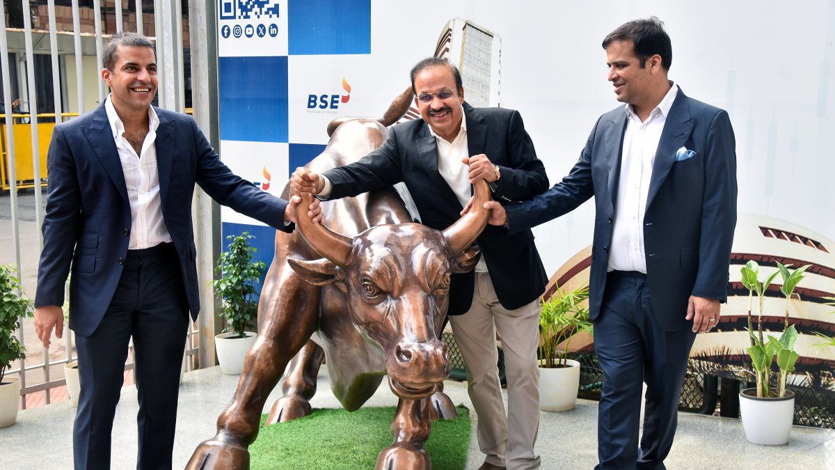 Hero Motors executives pose at BSE listing ceremony