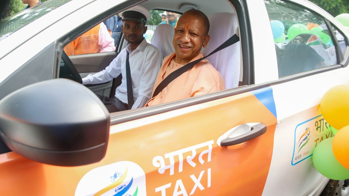 Yogi Adityanath sits in Bharat Taxi at Lucknow launch