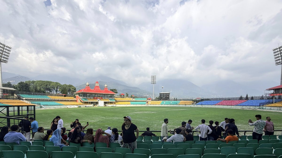 Fans watch cricket at Dharamsala stadium