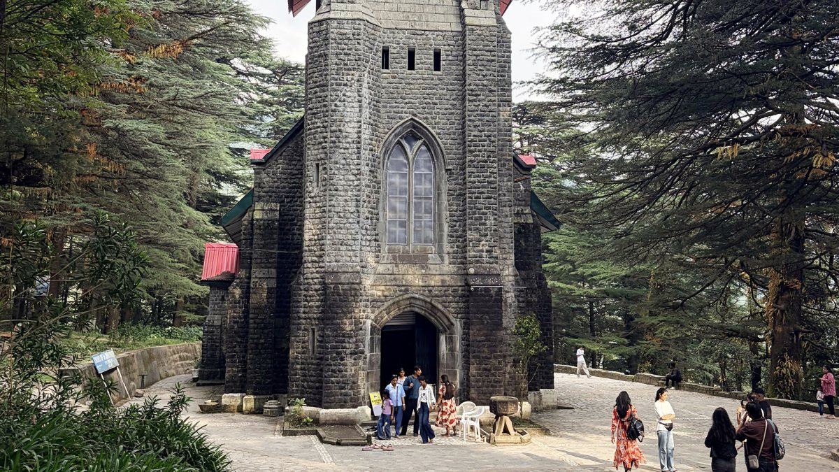 People visit St John in the Wilderness Church in Dharamshala