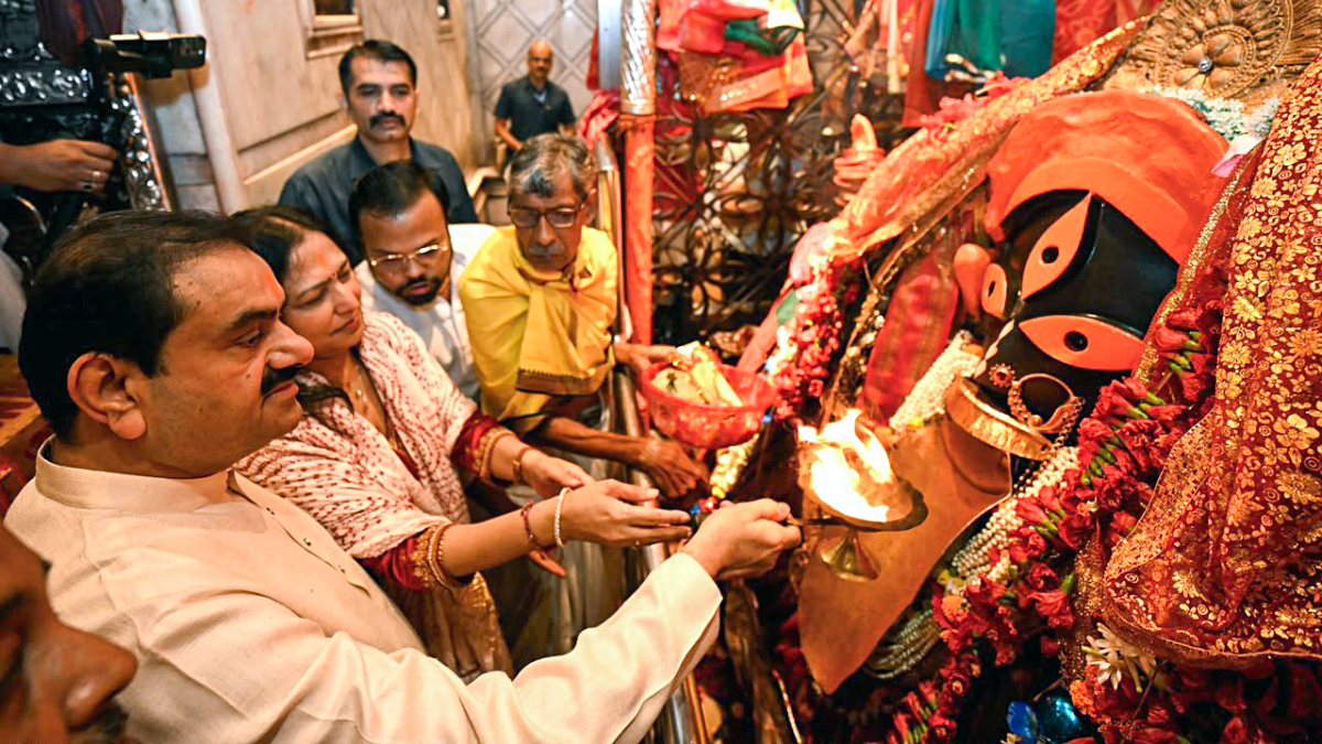 Gautam Adani and wife Priti offer prayers at Kalighat Kali Temple