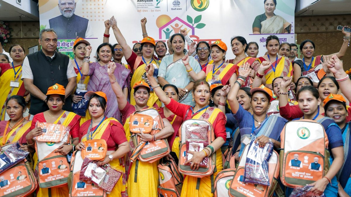 Delhi CM Rekha Gupta joins anganwadi workers at nutrition event
