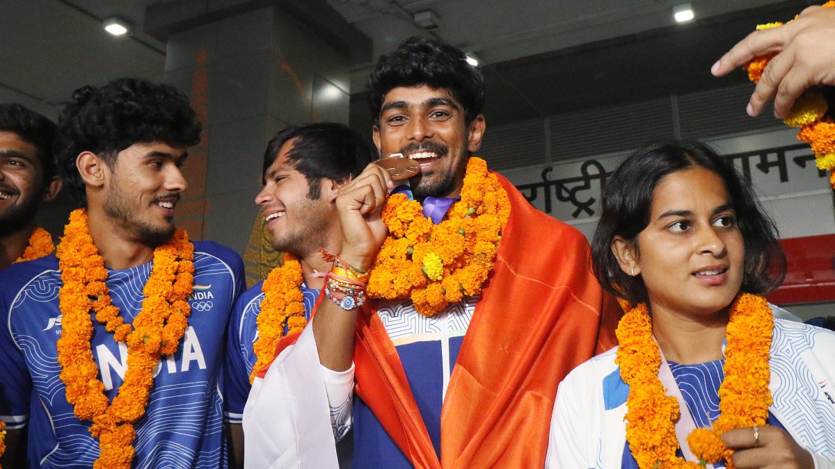 Asian Games bronze medalist Jay Meena welcomed home in New Delhi
