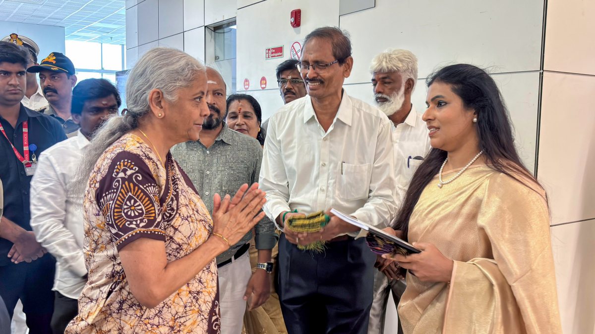 Nirmala Sitharaman greets BJP workers at Chennai airport