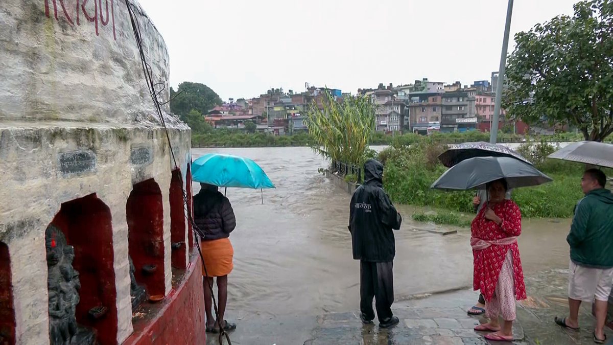 Kathmandu residents watch Bagmati river swell after heavy rain