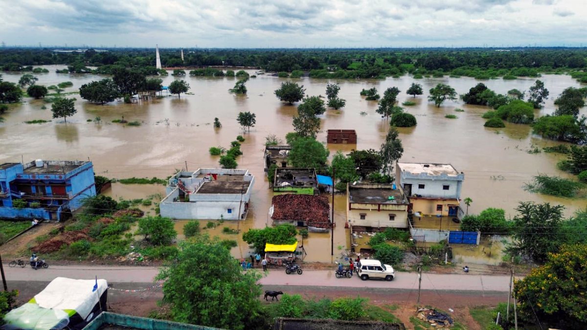 Floodwater inundates low-lying areas in Raipur village