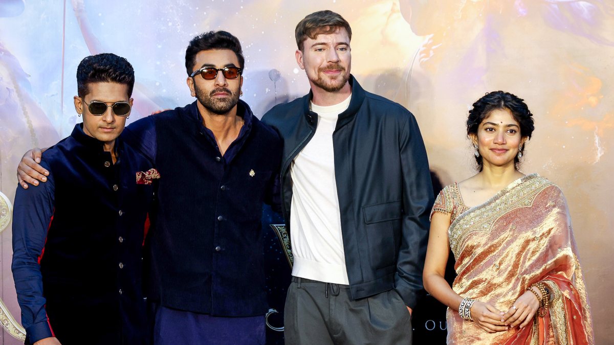 Sai Pallavi and Ranbir Kapoor pose with MrBeast at Ramayana event