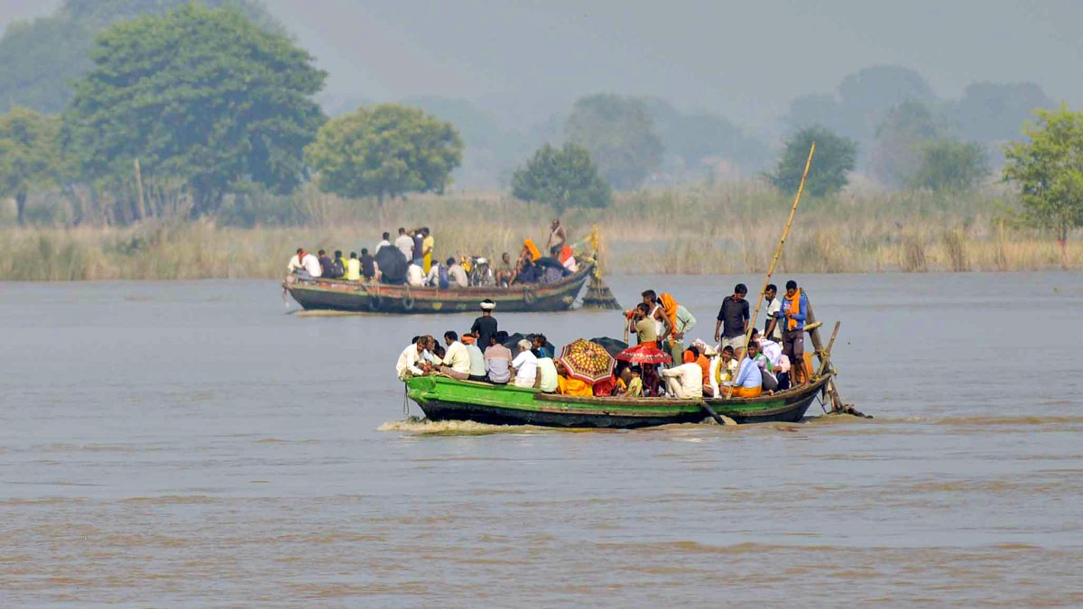 Patna locals ferried by boat as Ganga floods low lying areas