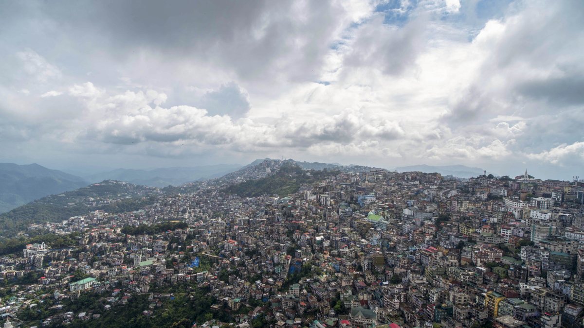 Dark clouds hover over Aizawl hill town
