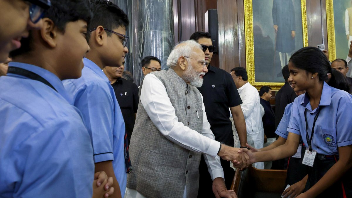 PM Modi interacts with students after paying homage to Gandhi and Shastri