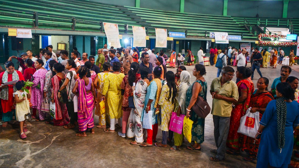 Siliguri residents queue at government welfare outreach camp