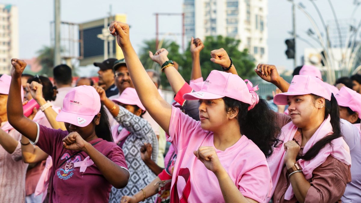 Participants warm up at Pink Wave 2026 breast cancer walkathon in Lucknow
