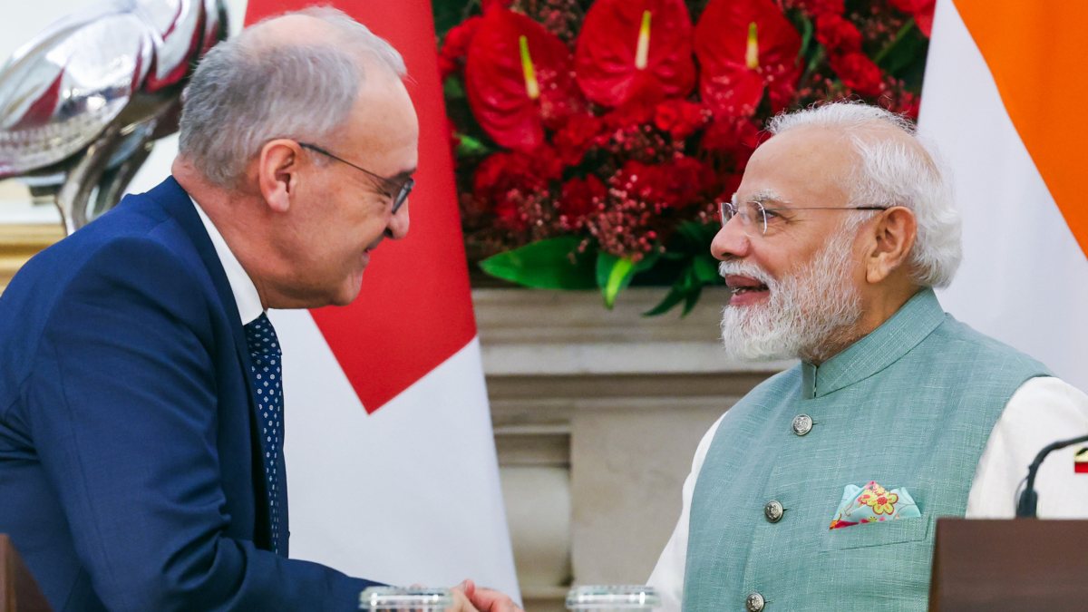PM Modi and Swiss president exchange handshake in Delhi