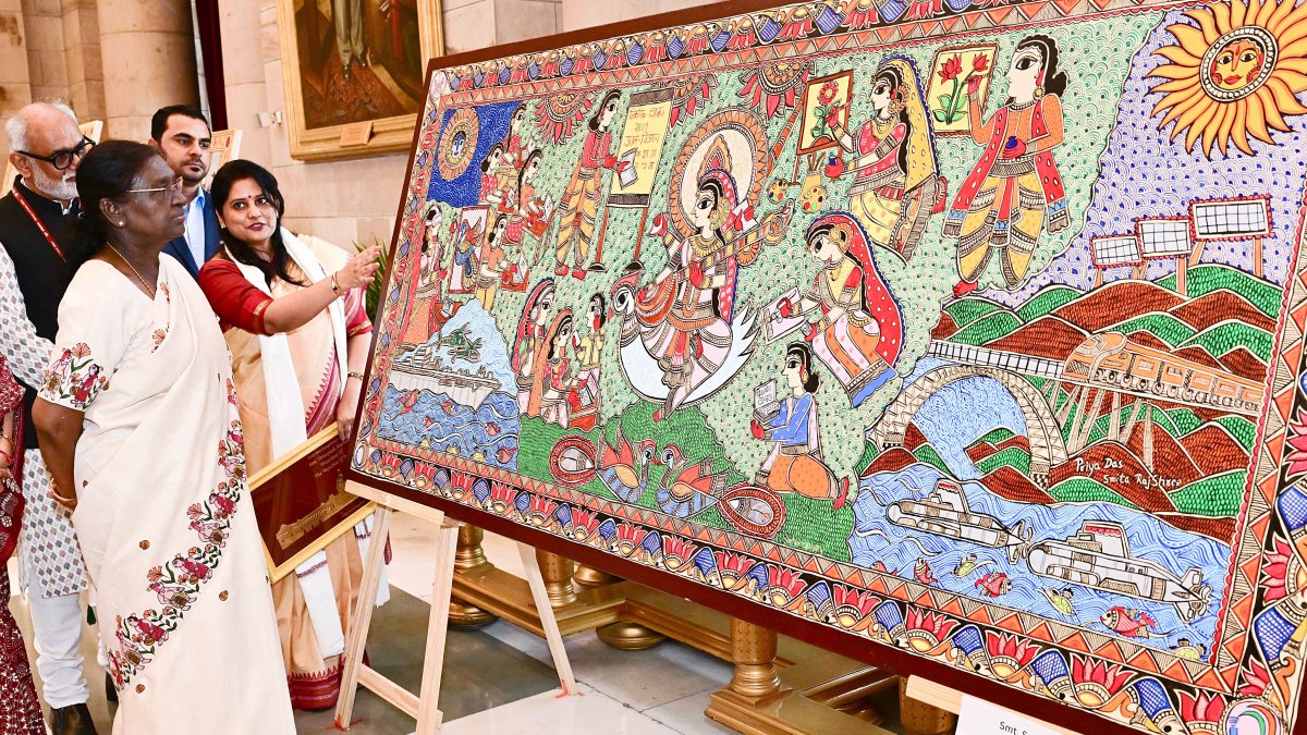 President Murmu views Madhubani painting at Rashtrapati Bhavan