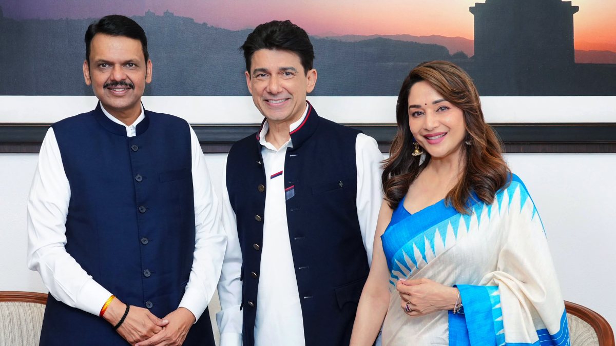 Fadnavis meets Madhuri Dixit and husband at Varsha