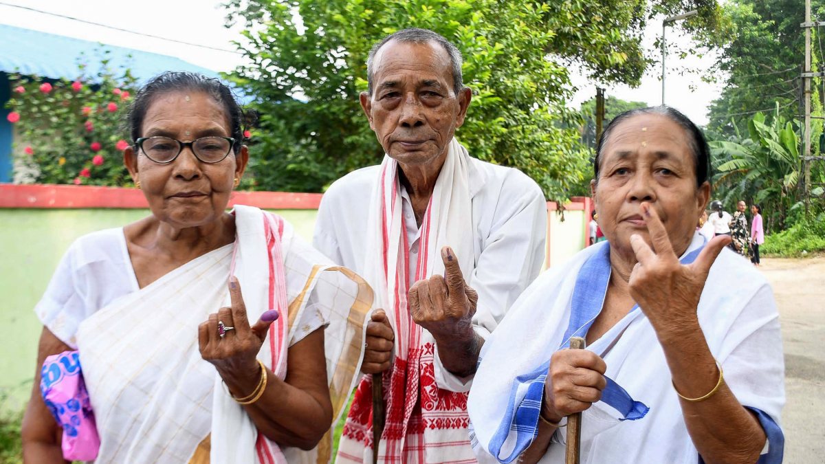 Elderly voters show inked fingers at Nagaon bypoll in Morigaon