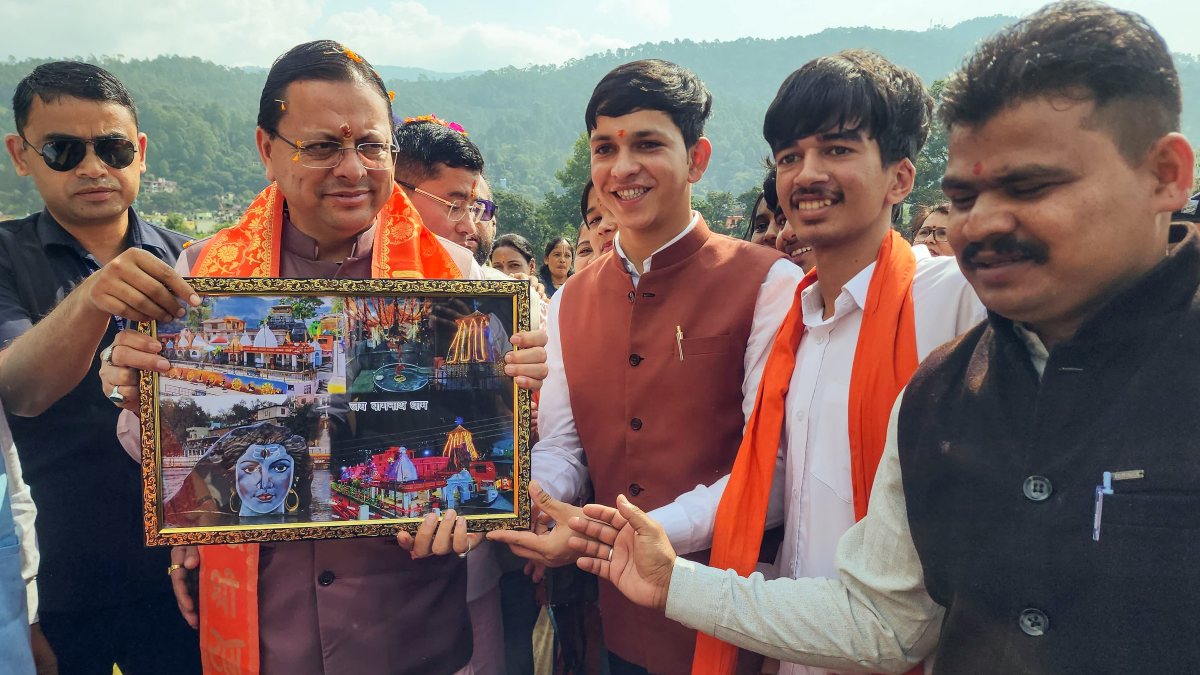 Uttarakhand CM Dhami felicitated with portrait by BJP workers in Bageshwar
