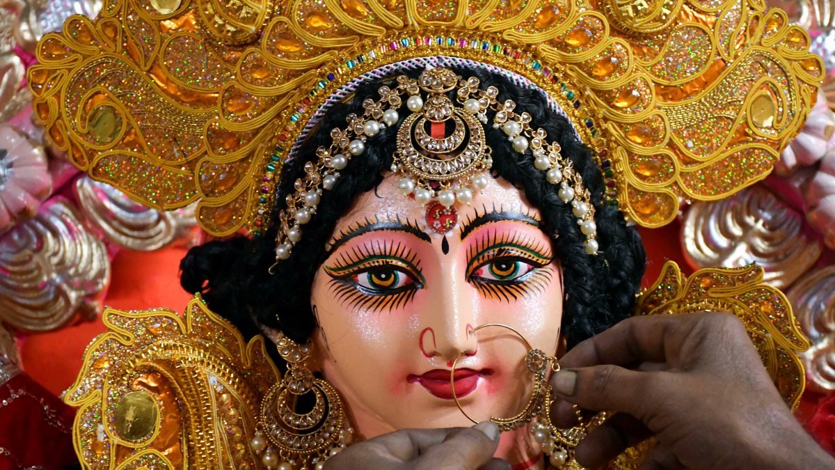 Artisan gives finishing touches to Durga idol in Prayagraj