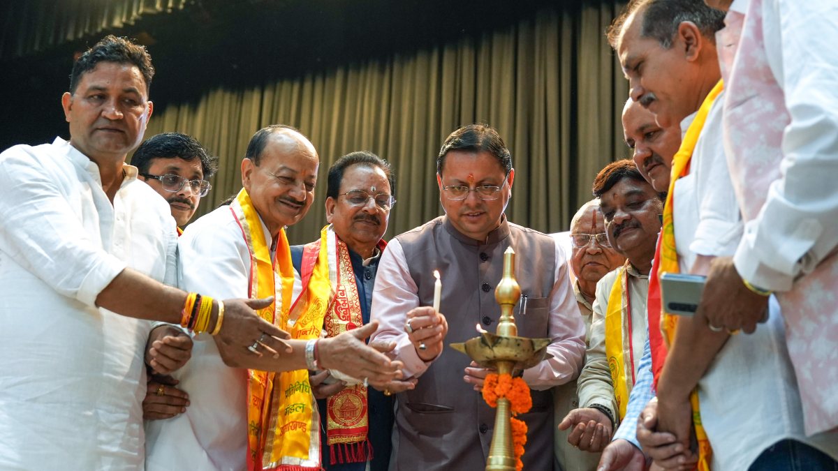 Uttarakhand CM Dhami lights lamp at traders' conference in Haldwani