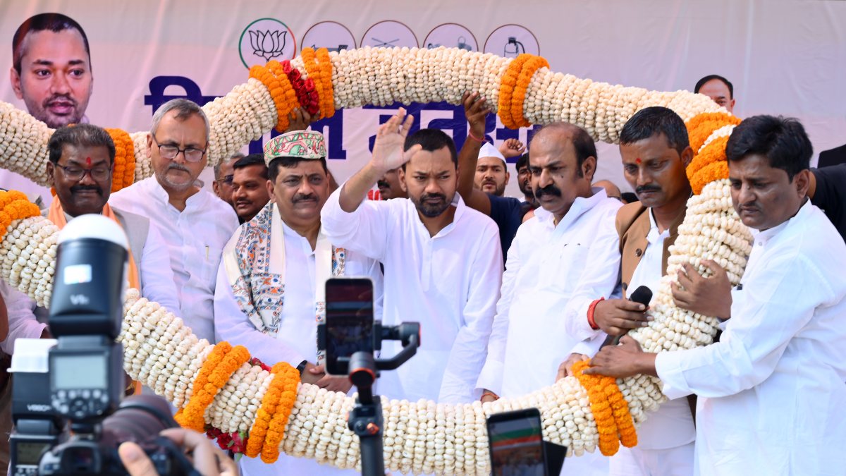 Bihar health minister Nishant Kumar garlanded at Darbhanga poll event