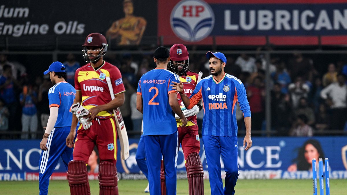 Indian players greet West Indies players after 3rd T20I in Indore