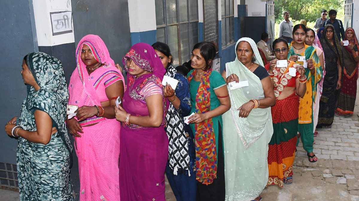 Voters queue to cast votes in Kanpur bypoll