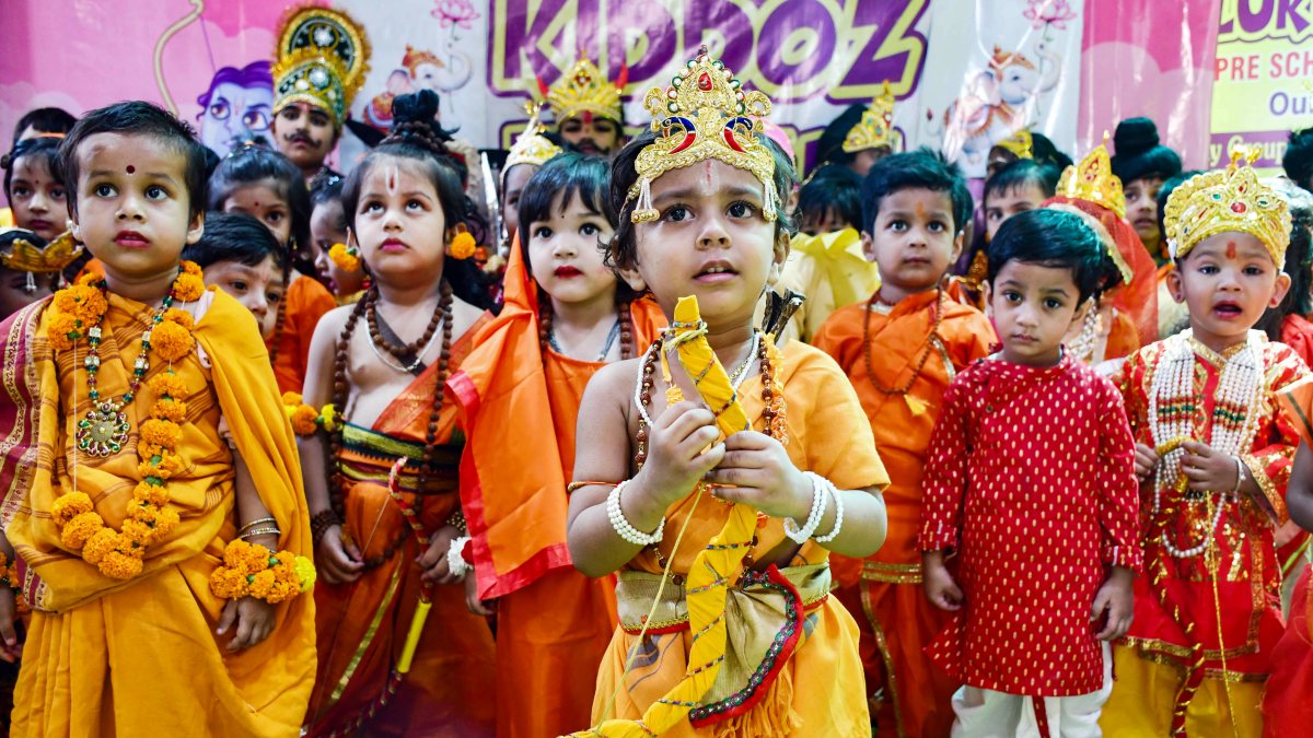 Children pose in Ramleela costumes at Prayagraj Dussehra event