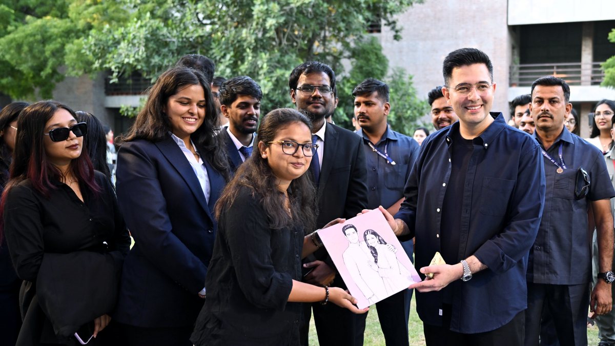 BJP MP Raghav Chadha receives sketch at IIM Ahmedabad summit