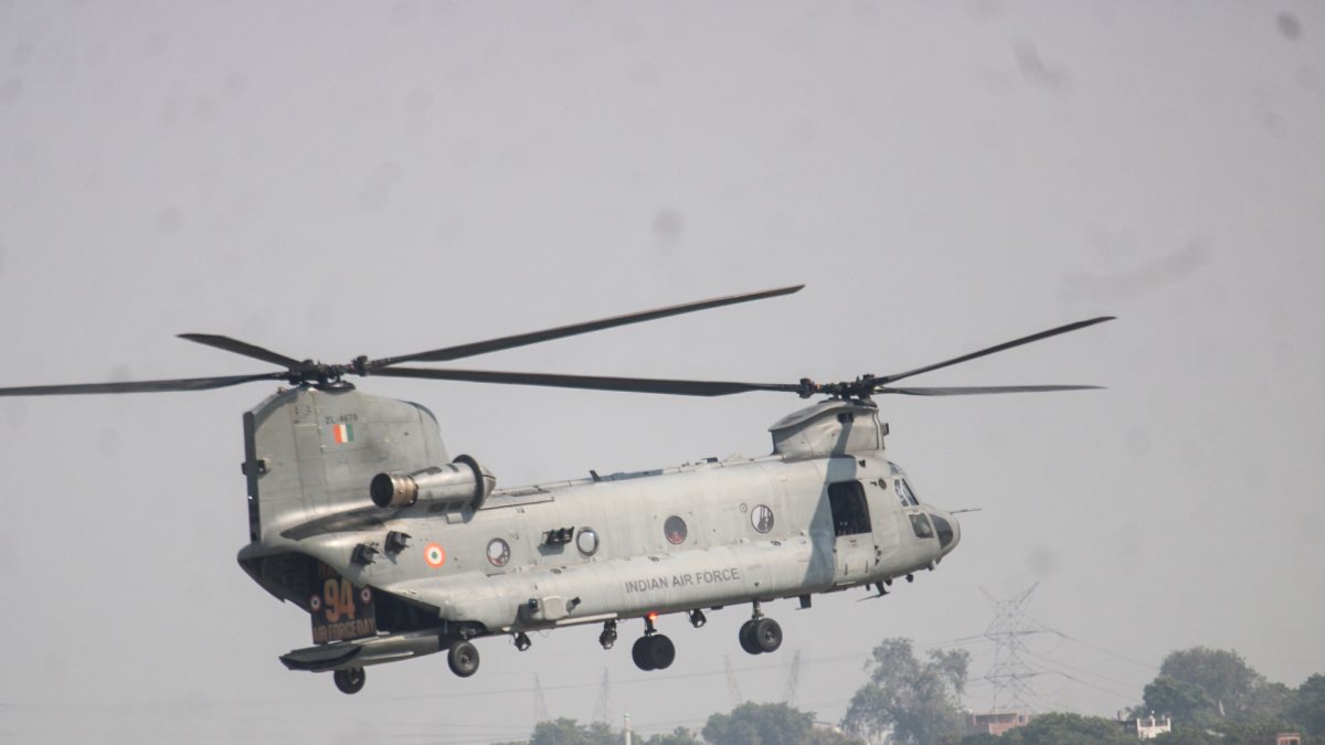 IAF Chinook helicopter flies during air show rehearsal in Varanasi
