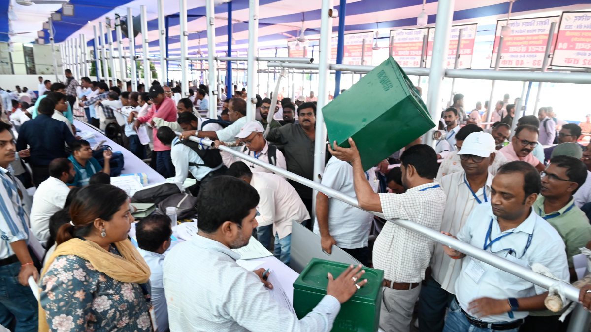 Polling officials collect ballot boxes in Patna ahead of Bihar MLC election