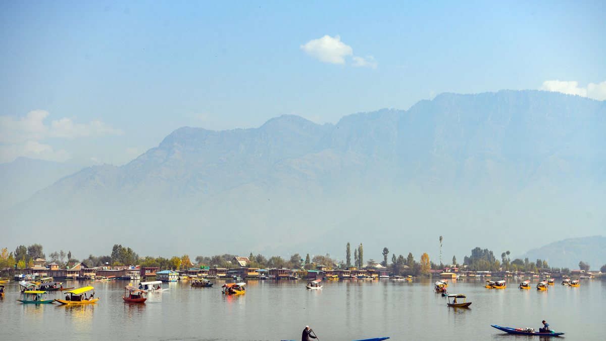 Tourists enjoy Shikara rides on Dal Lake in Srinagar