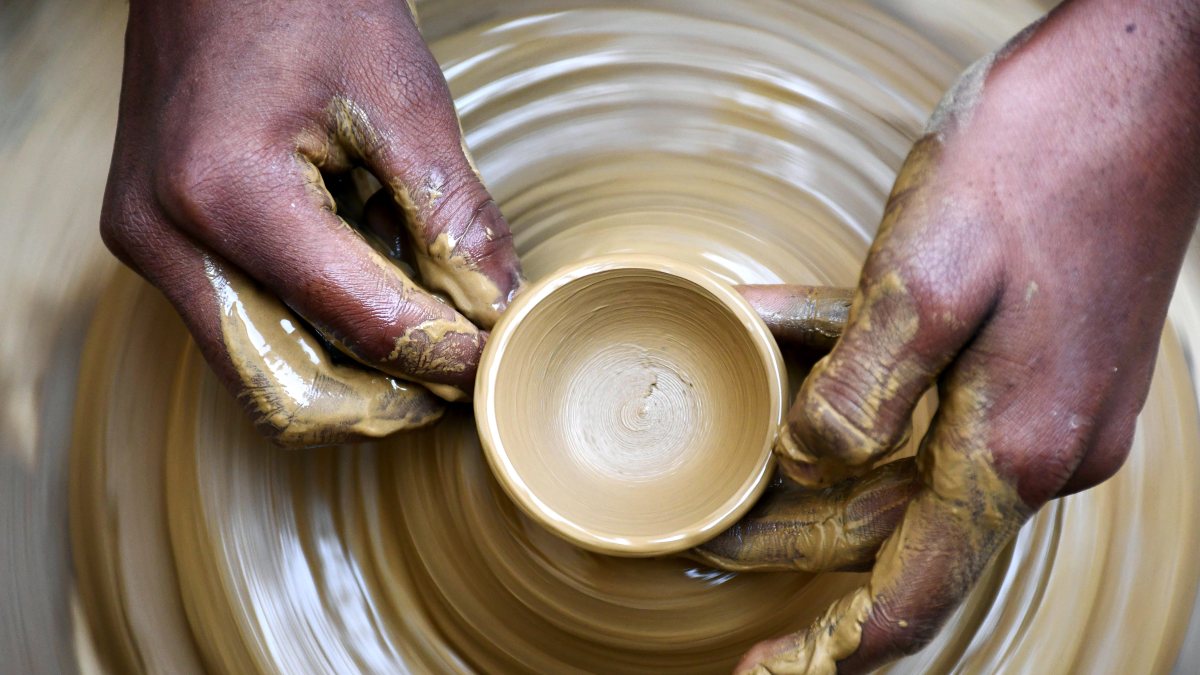 Potter shapes earthen lamp on wheel ahead of Diwali in Prayagraj