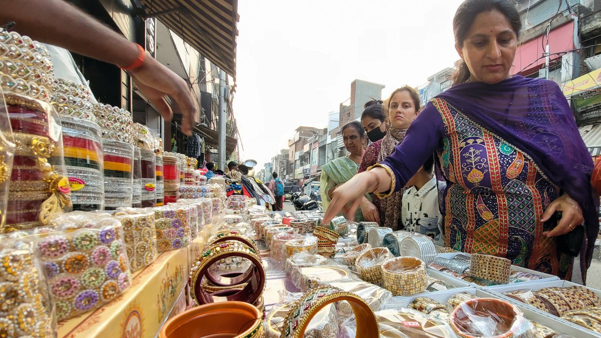 Women shop for bangles ahead of Karwa Chauth in Samba