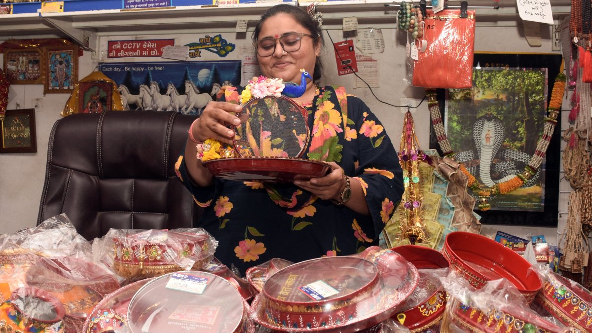 Woman buys puja kits ahead of Karwa Chauth in Surat