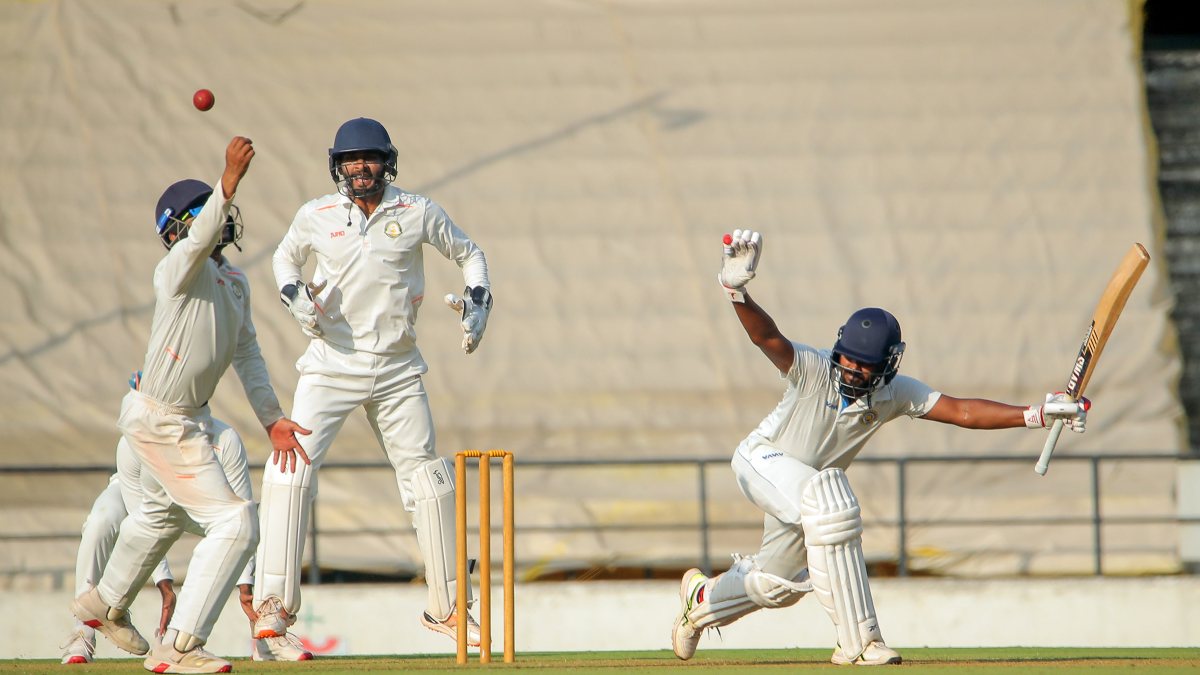 Vidarbha fielders go for a catch in Ranji Trophy match against Goa